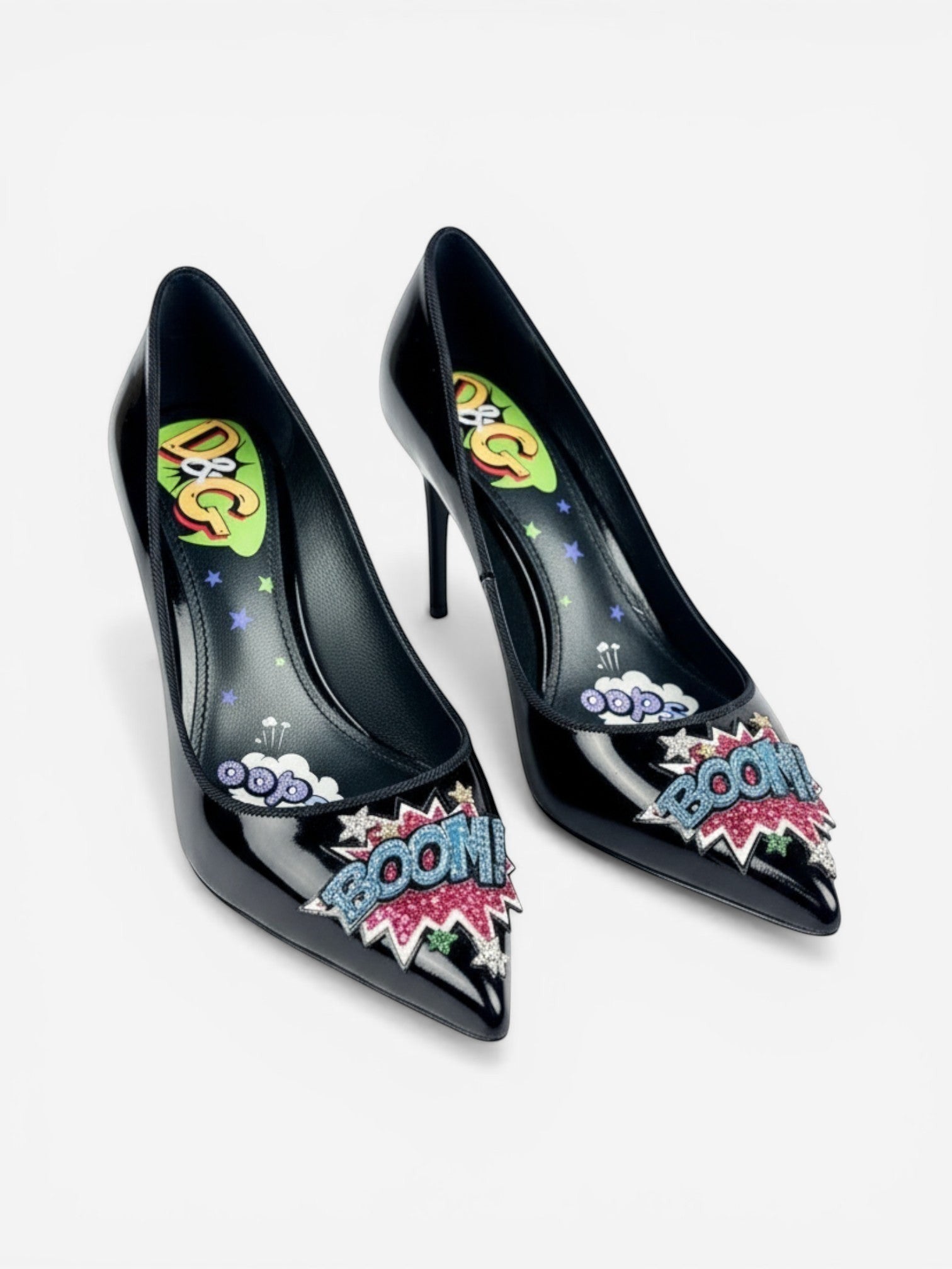 Vestir Dolce & Gabbana black patent leather pumps with comic pop art "BOOM!" appliqué and kitten heel.